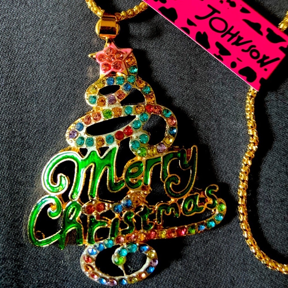 BJ green Christmas tree necklace with Merry Christmas written across bottom.